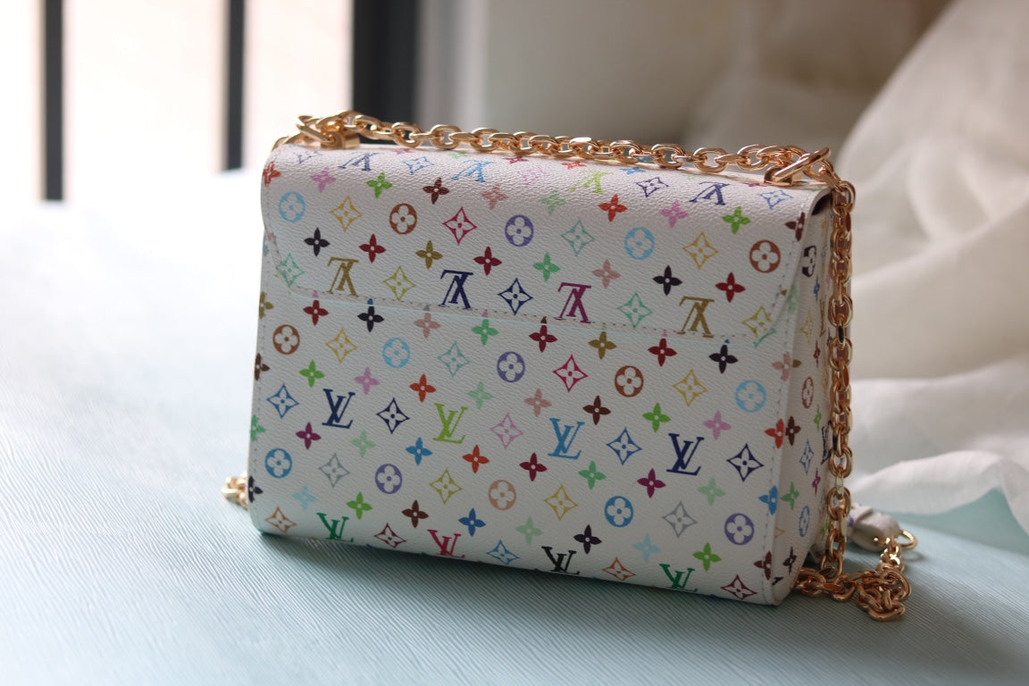 Louis Vuitton TWIST Medium Handbag