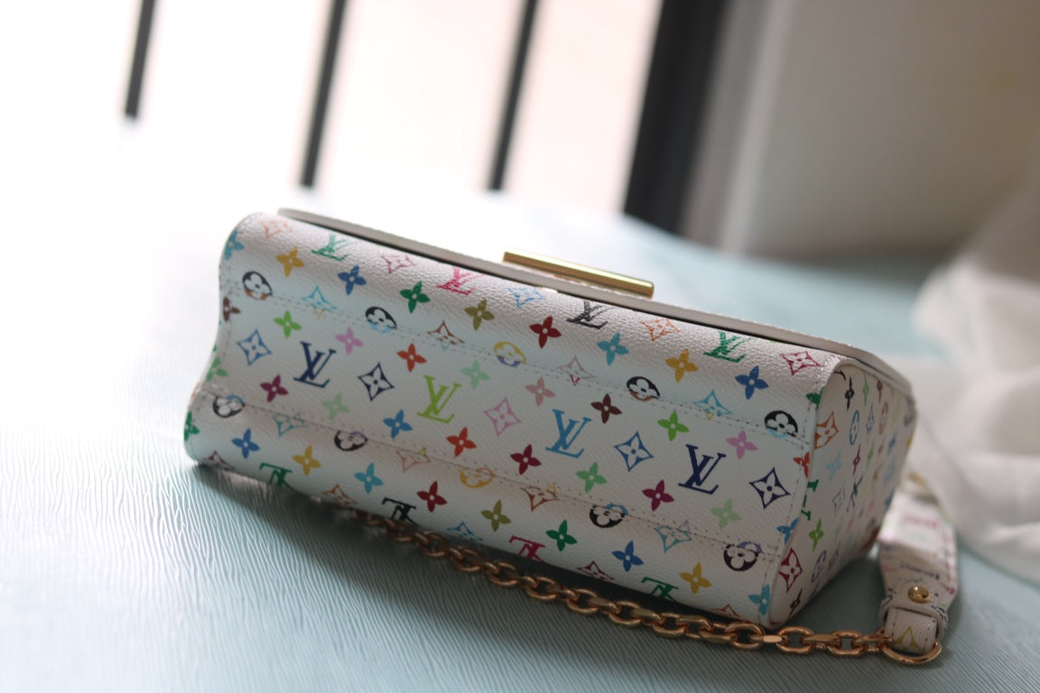 Louis Vuitton TWIST Medium Handbag