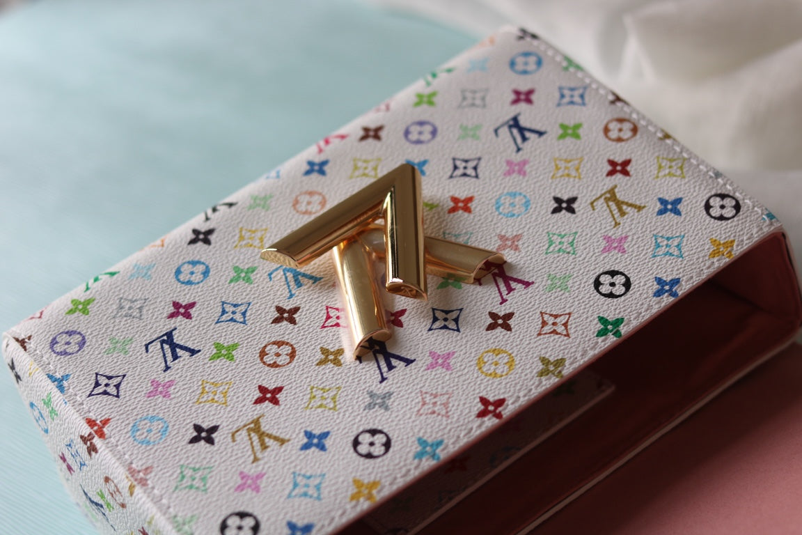 Louis Vuitton TWIST Medium Handbag