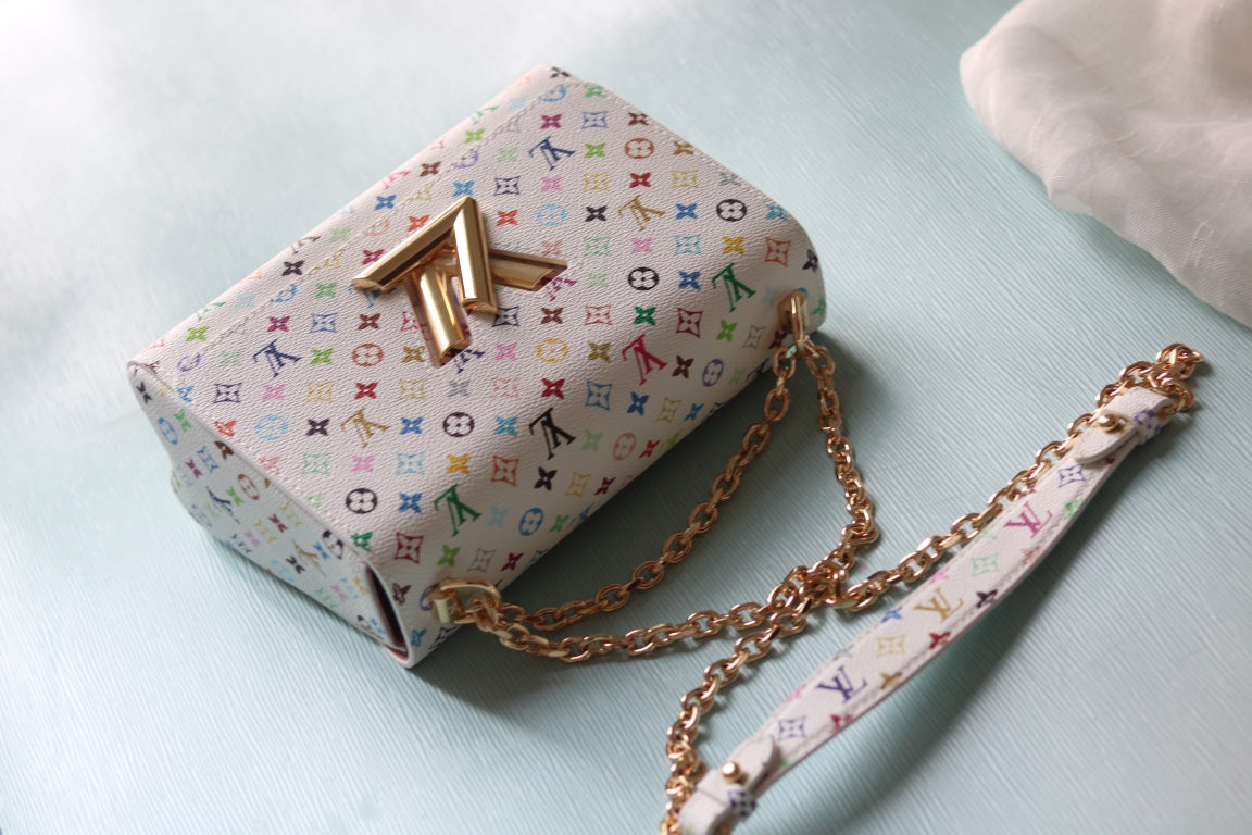 Louis Vuitton TWIST Medium Handbag